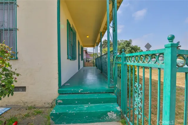 a front view of house with pathway and yard