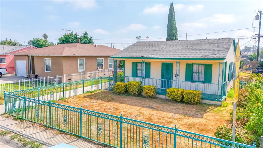 1208 South White Avenue Compton, CA 90221 - Photo 35 of 46 a view of a house with pool and chairs