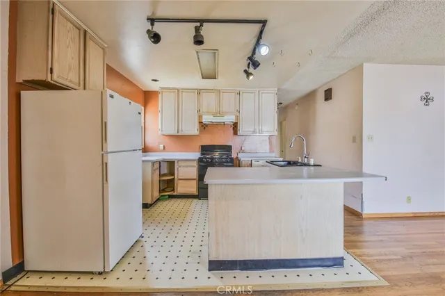 a large kitchen with cabinets