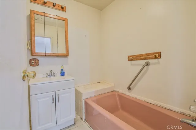 a bathroom with a sink and a bathtub