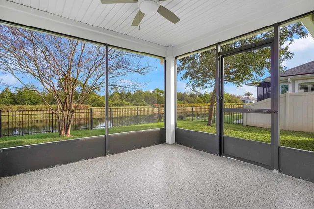 a view of an interior & garden