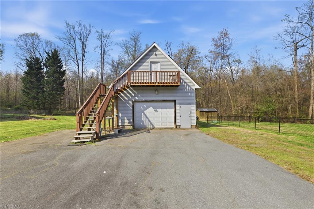 1313 Ridgewood Avenue Reidsville, NC 27320 - Photo 30 of 41 Garage with room on back and bonus man cave/apartment upstairs