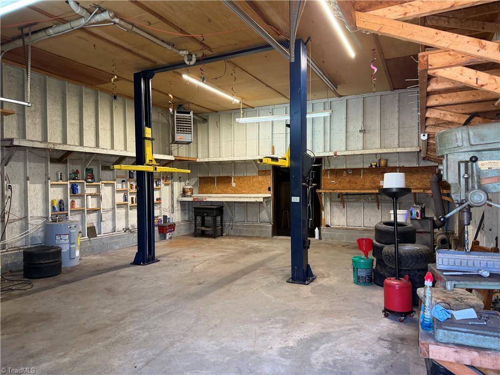 1313 Ridgewood Avenue Reidsville, NC 27320 - Photo 35 of 41 garage area with lift that conveys