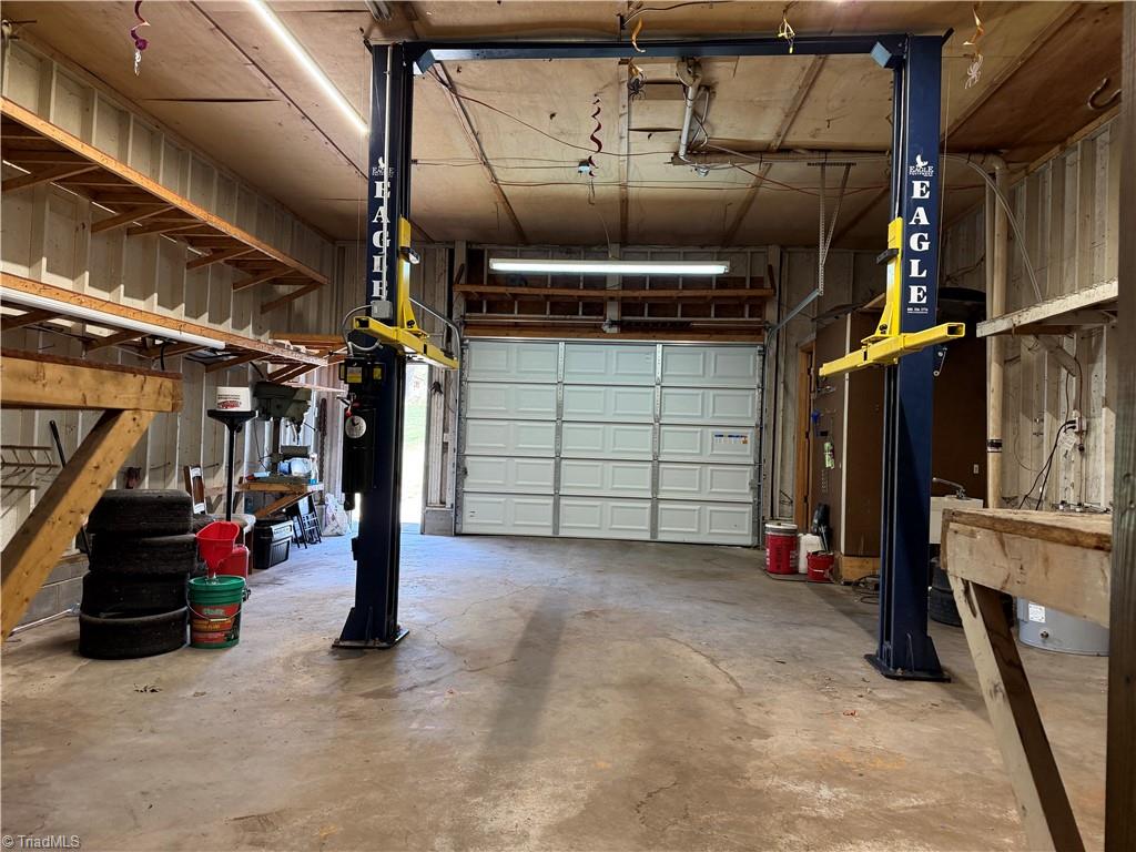 1313 Ridgewood Avenue Reidsville, NC 27320 - Photo 36 of 41 garage with lift that conveys