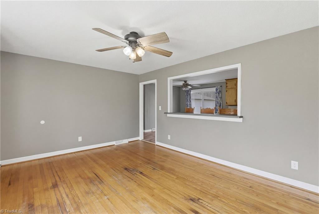 1313 Ridgewood Avenue Reidsville, NC 27320 - Photo 9 of 41 View of living room and view into the dining room