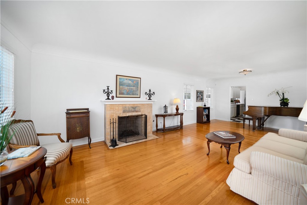 945 Cabrillo Drive Glendale, CA 91207 - Photo 6 of 38 a living room with furniture and a fireplace