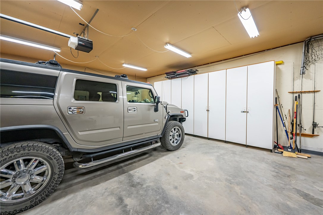14158 Calabasas Road Yucca, AZ 86438 - Photo 27 of 99 a view of a garage with car parked
