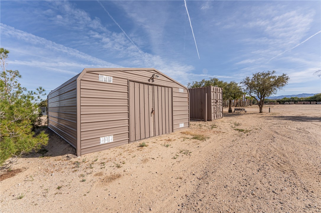 14158 Calabasas Road Yucca, AZ 86438 - Photo 34 of 99 View of shed