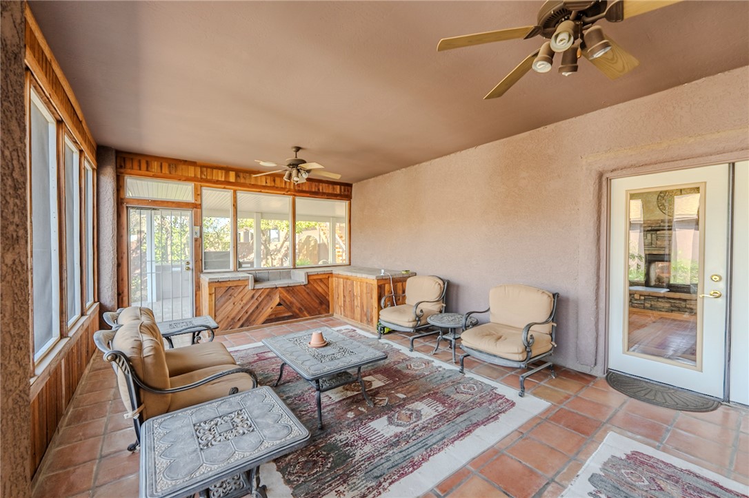14158 Calabasas Road Yucca, AZ 86438 - Photo 66 of 99 Sunroom with tile floors and french doors