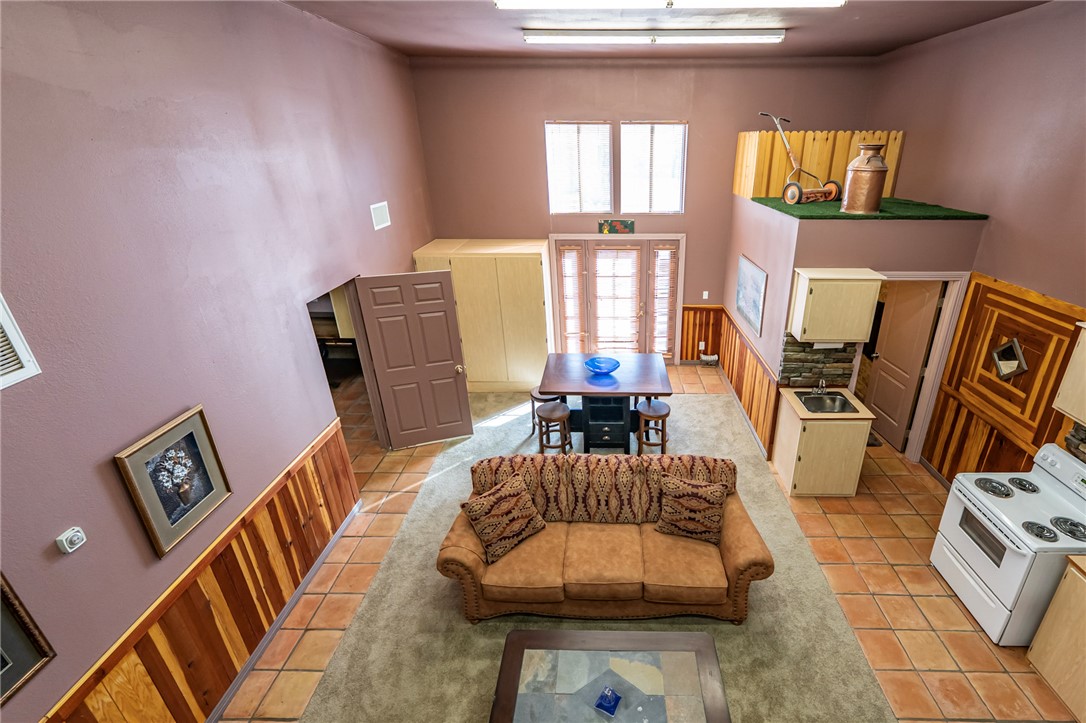 14158 Calabasas Road Yucca, AZ 86438 - Photo 85 of 99 a living room with furniture and wooden floor