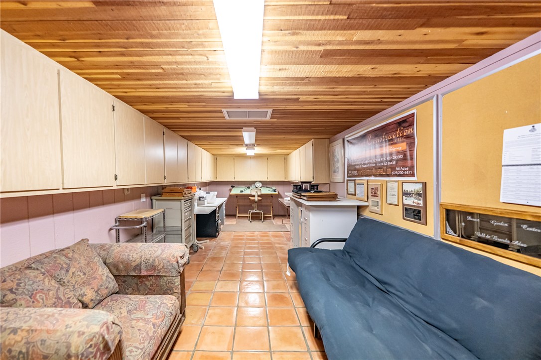 14158 Calabasas Road Yucca, AZ 86438 - Photo 87 of 99 a living room with furniture and a wooden floor