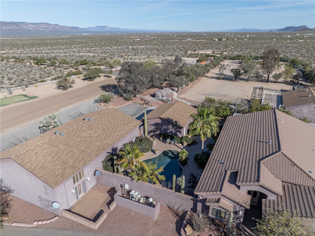 14158 Calabasas Road Yucca, AZ 86438 - Photo 9 of 99 an aerial view of a house with a yard and ocean view