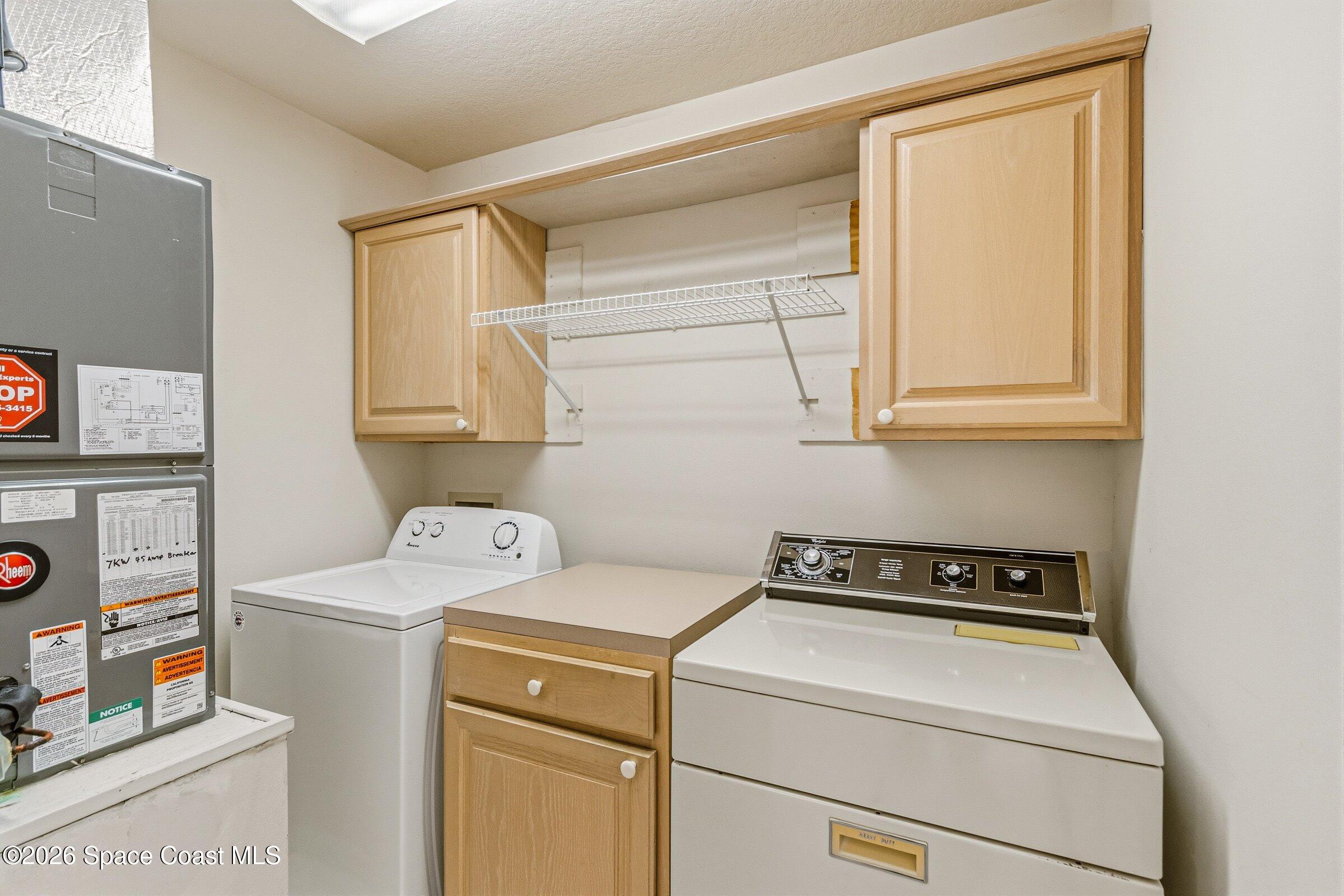 975 South Fork Circle Melbourne, FL 32901 - Photo 15 of 44 a utility room with dryer and washer