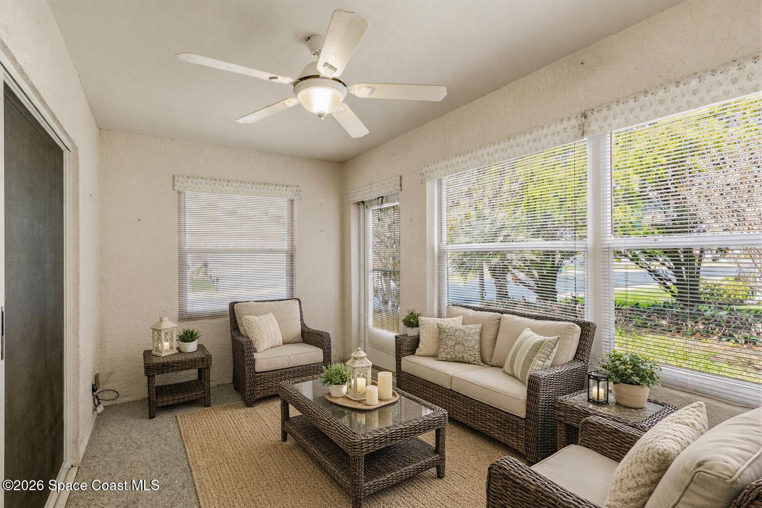 975 South Fork Circle Melbourne, FL 32901 - Photo 16 of 44 a living room with furniture and a large window