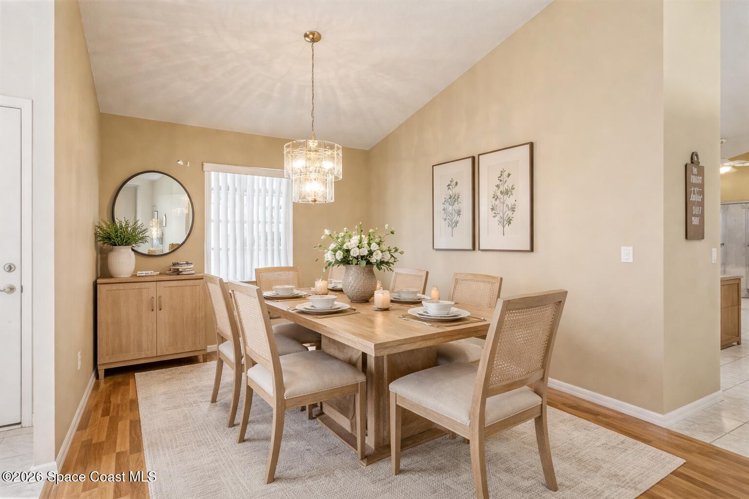 975 South Fork Circle Melbourne, FL 32901 - Photo 5 of 44 a view of a dining room with furniture and chandelier