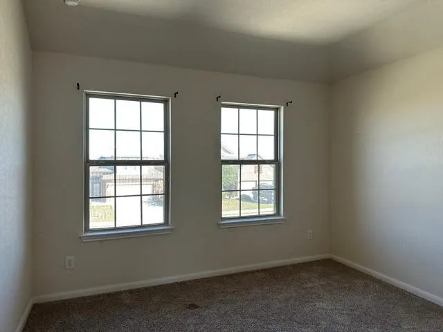 a back view of a house with a window