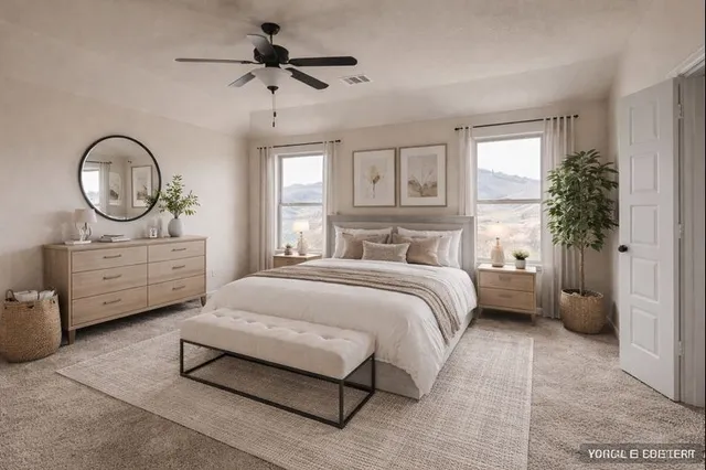 a bedroom with a bed a chandelier and a window