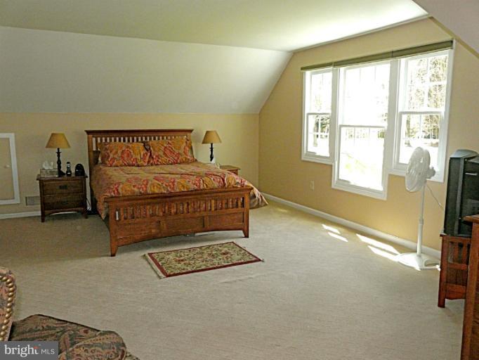 16 Manor Brook Road Monkton, MD 21111 - Photo 1 of 30 a bedroom with a bed and a window
