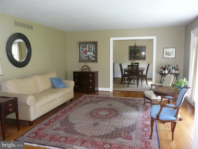 16 Manor Brook Road Monkton, MD 21111 - Photo 11 of 30 a living room with furniture and a dining table