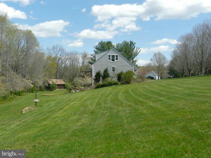 16 Manor Brook Road Monkton, MD 21111 - Photo 8 of 30 a view of a grassy field with an trees