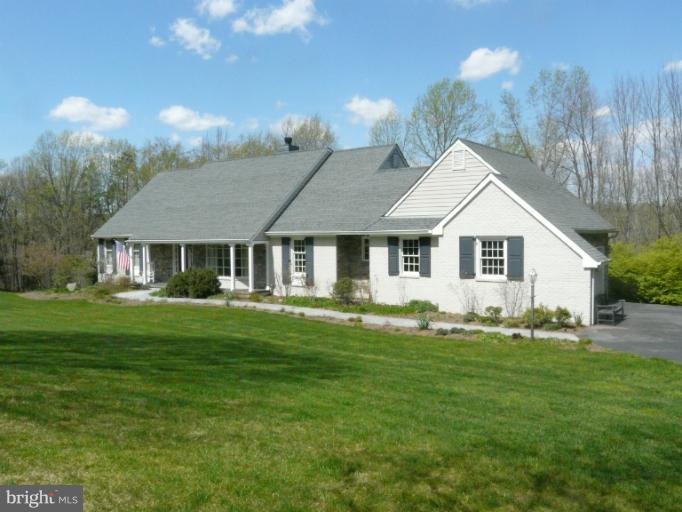 16 Manor Brook Road Monkton, MD 21111 - Photo 9 of 30 a front view of a house with a garden