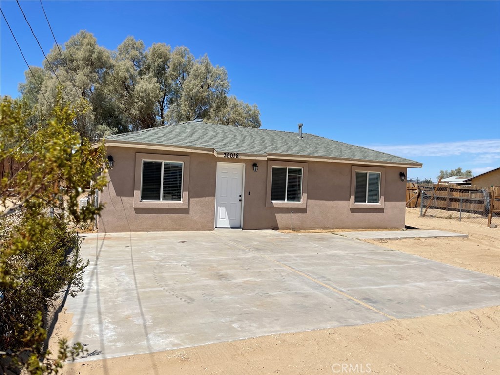 a front view of a house with a garage