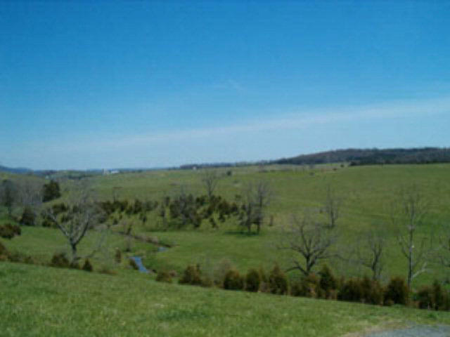 6353 Spring Hill Road Bridgewater, VA 22812 - Photo 1 of 1 a view of a lake with a yard