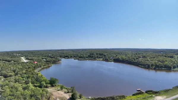 a view of a lake with outdoor space