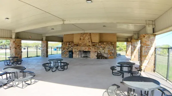 an aerial view of a house with a garden