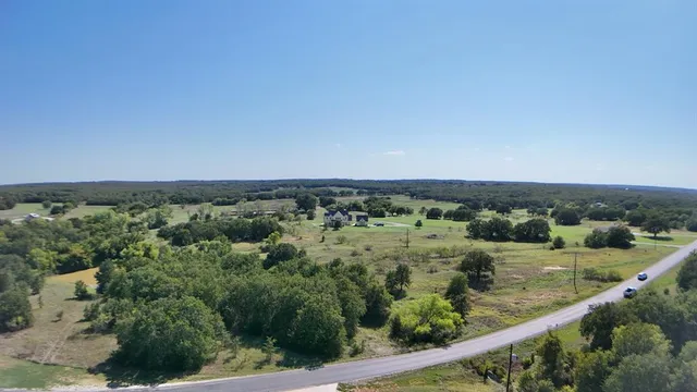 an aerial view of mountain with trees