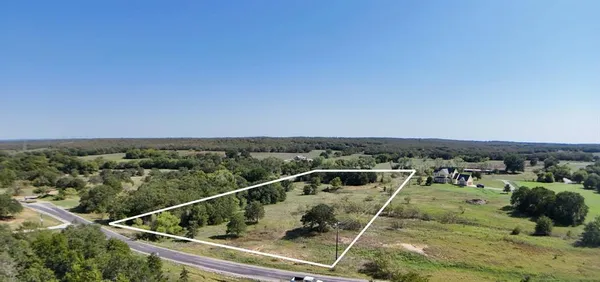 a view of a balcony with city view