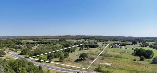a view of a balcony with city view