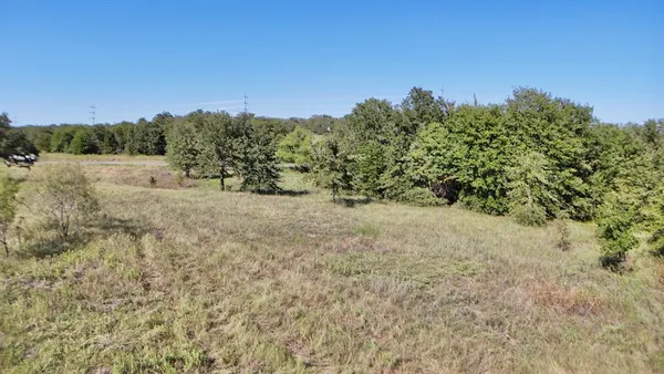 a view of a open space with mountain view