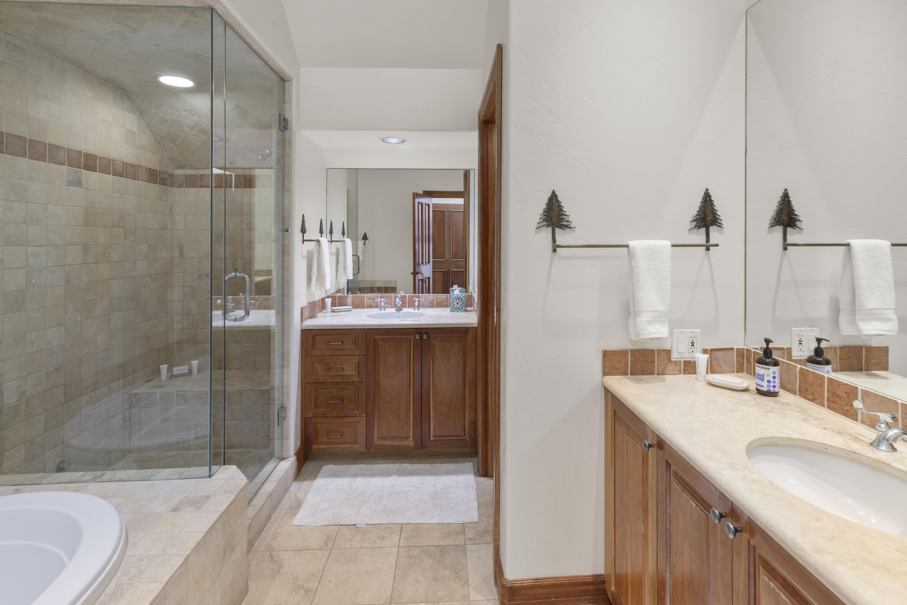 120 Vischer Drive, Unit 135 Mountain Village, CO 81435 - Photo 21 of 35 a bathroom with a sink double vanity and a shower