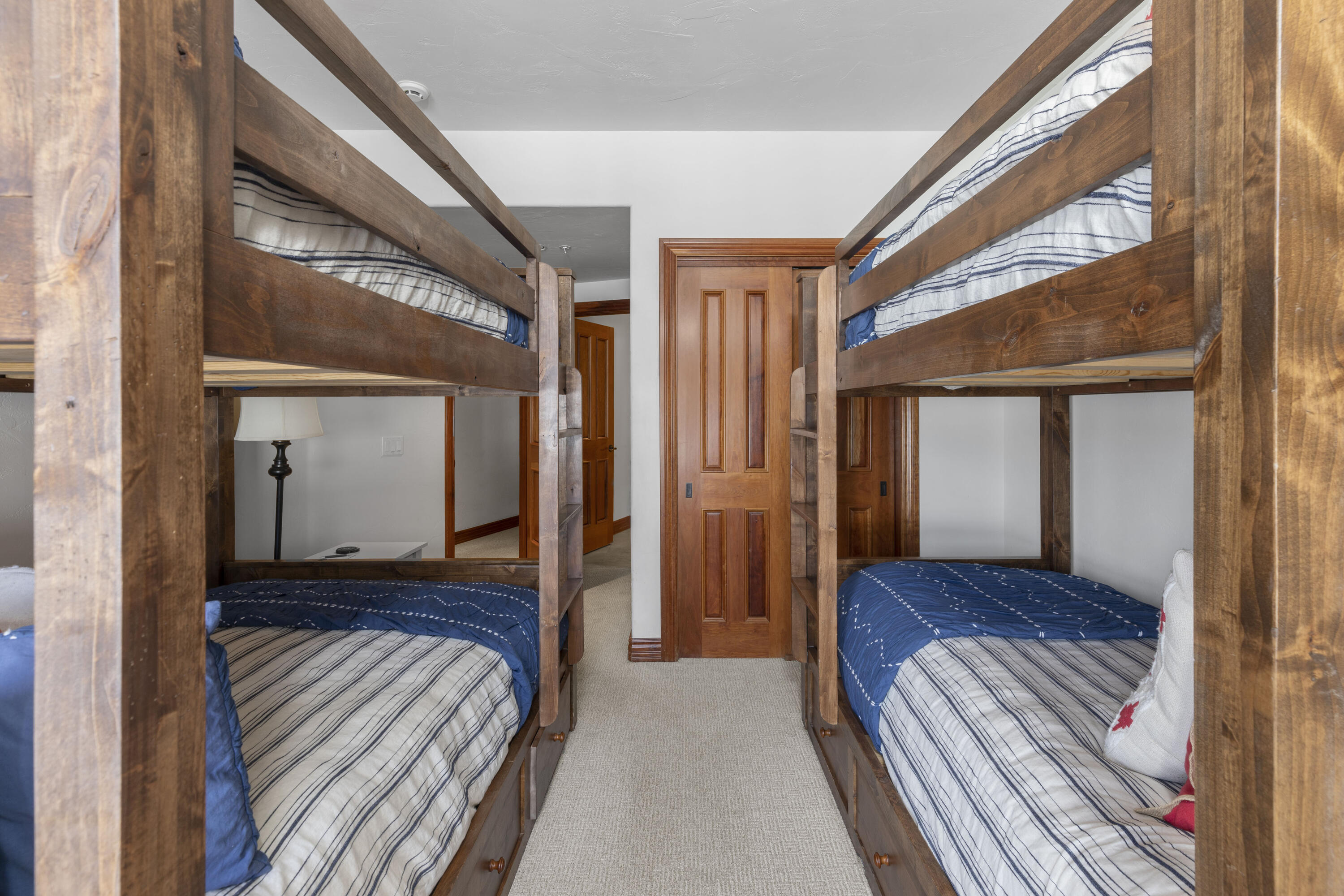 120 Vischer Drive, Unit 135 Mountain Village, CO 81435 - Photo 24 of 35 a view of bedroom with wooden floor