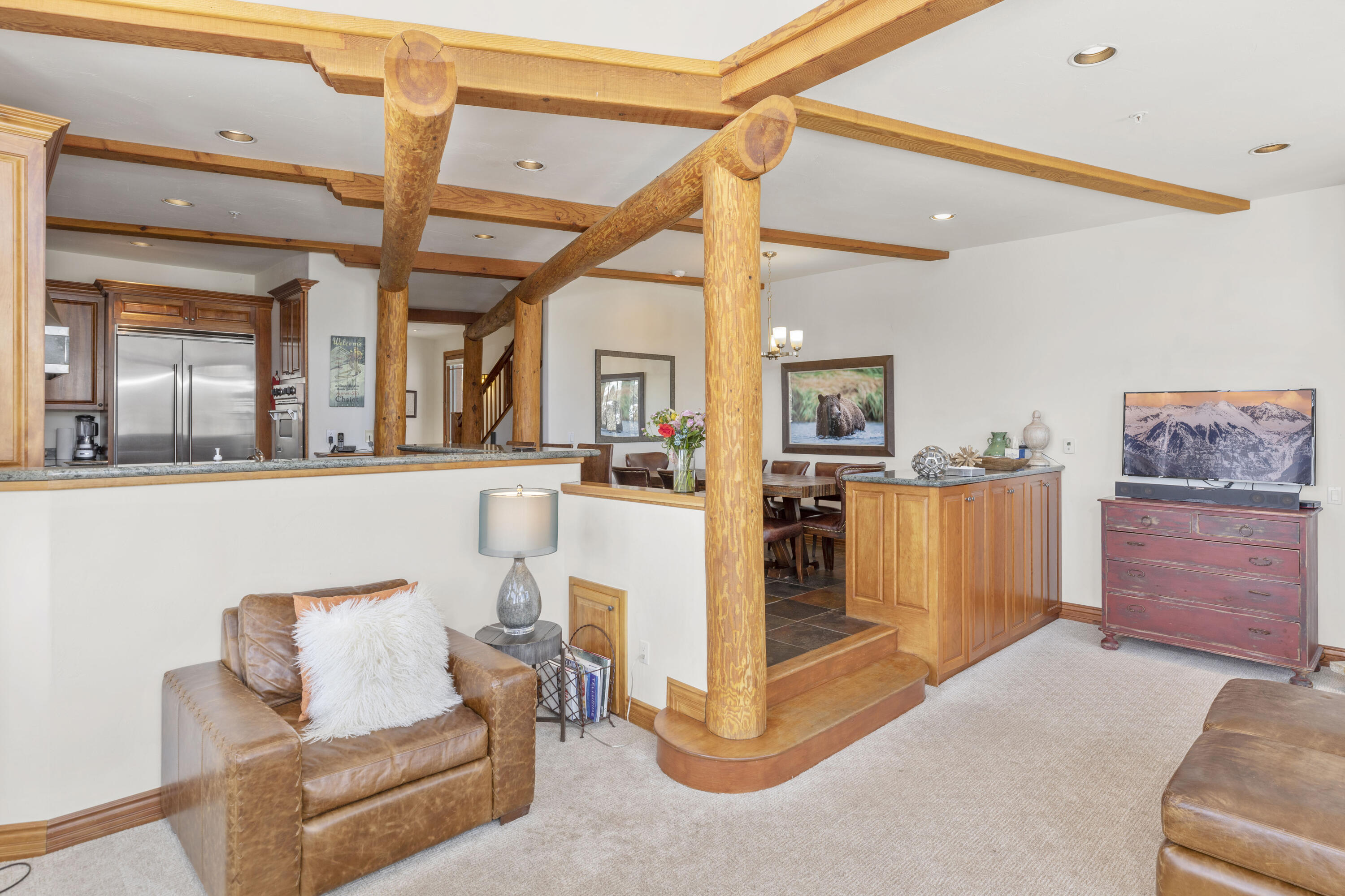 120 Vischer Drive, Unit 135 Mountain Village, CO 81435 - Photo 7 of 35 a living room with furniture and wooden floor