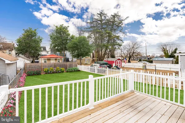a view of a house with a back yard