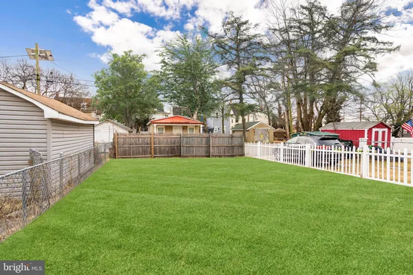 an aerial view of residential building with parking space
