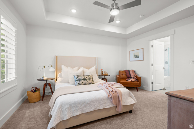 2706 West Maple Street, Unit 285 Mapleton, UT 84664 - Photo 17 of 36 Bedroom featuring a tray ceiling with recessed lighting and a ceiling fan