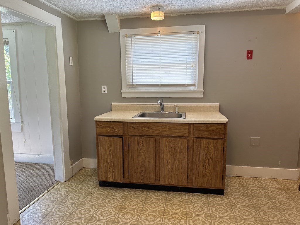 9 West Farms Road Northampton, MA 01062 - Photo 11 of 31 a bathroom with a sink and a mirror