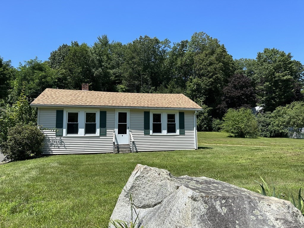 9 West Farms Road Northampton, MA 01062 - Photo 2 of 31 a front view of a house with a yard