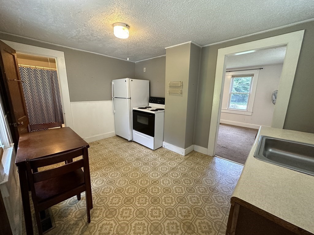 9 West Farms Road Northampton, MA 01062 - Photo 7 of 31 a room with furniture and a window