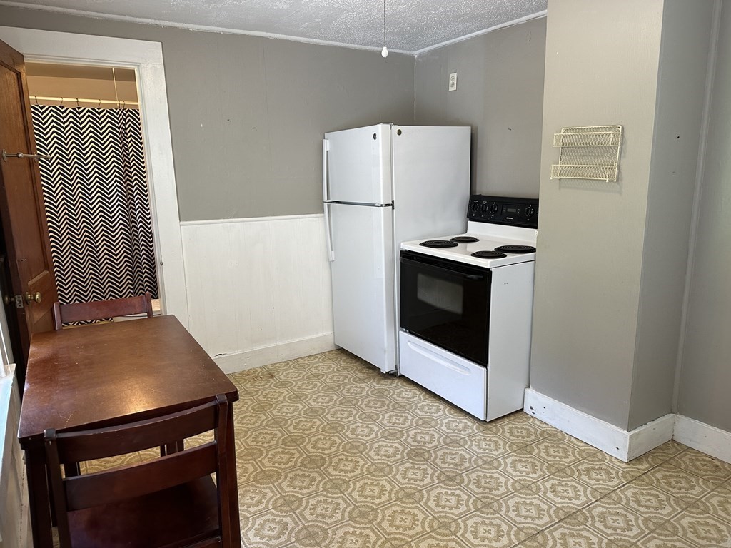 9 West Farms Road Northampton, MA 01062 - Photo 10 of 31 a view of kitchen with stainless steel appliances granite countertop cabinets and a refrigerator