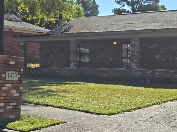 a view of swimming pool with a yard