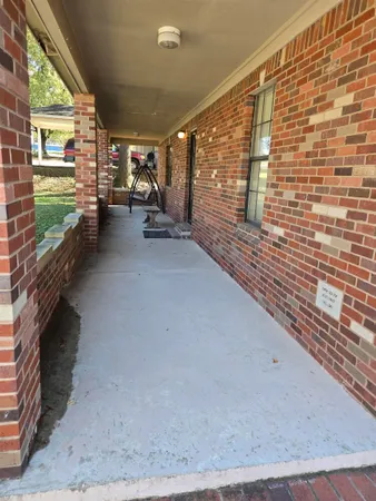 a view of a yard with an outdoor space