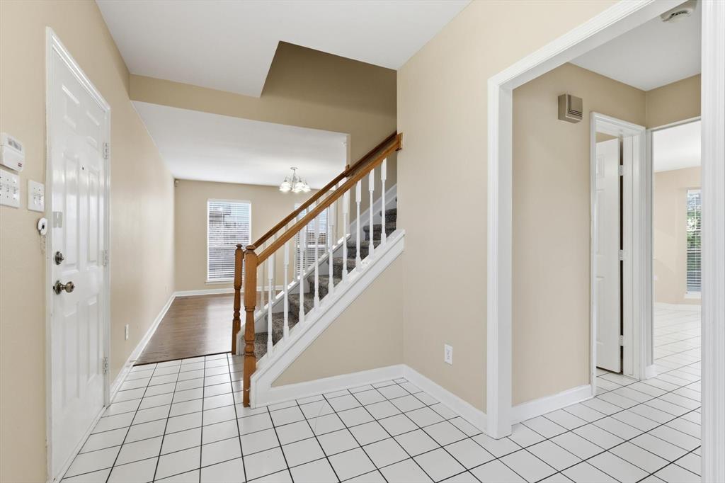 5512 Rocky Mountain Road Fort Worth, TX 76137 - Photo 8 of 33 a view of an entryway with wooden floor