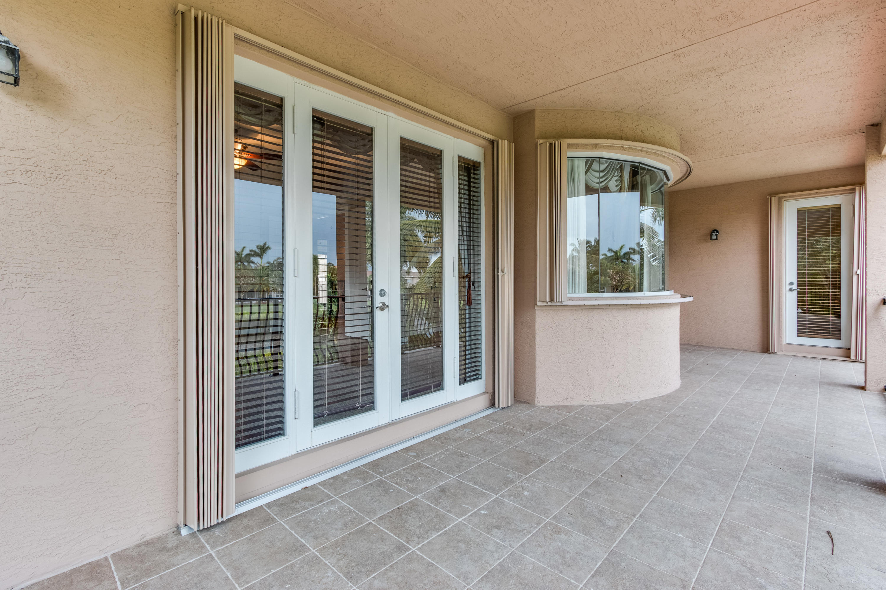 11193 Sunset Ridge Circle Boynton Beach, FL 33473 - Photo 18 of 44 Accordion Shutters
