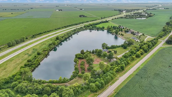a view of outdoor space with deck and yard