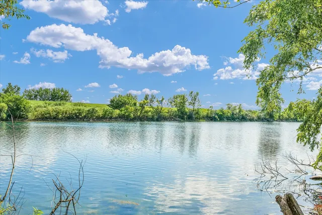 a view of a lake with a mountain in the background