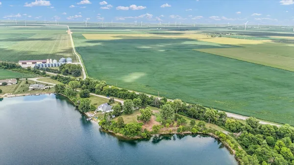 a view of a lake with a yard